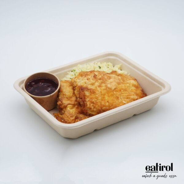 Pariser Schnitzel vom Schwein mit Butter Kräuter Reis